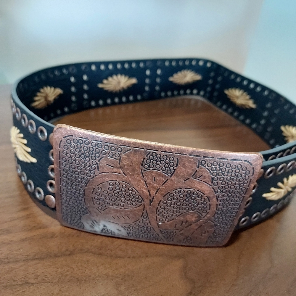 Black belt with copper closre